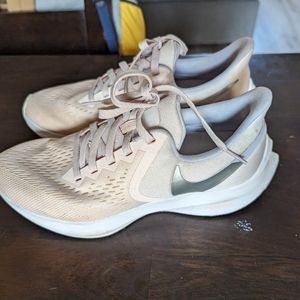 Light pink Nike running shoes 8.5